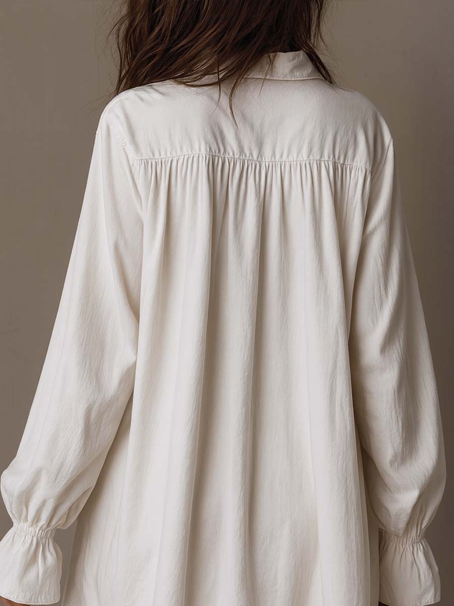 Amparo - Irregular Hem Long-sleeved Shirt Dress