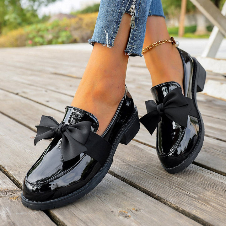 Astreaica - Patent Leather Loafer With Bow Accent
