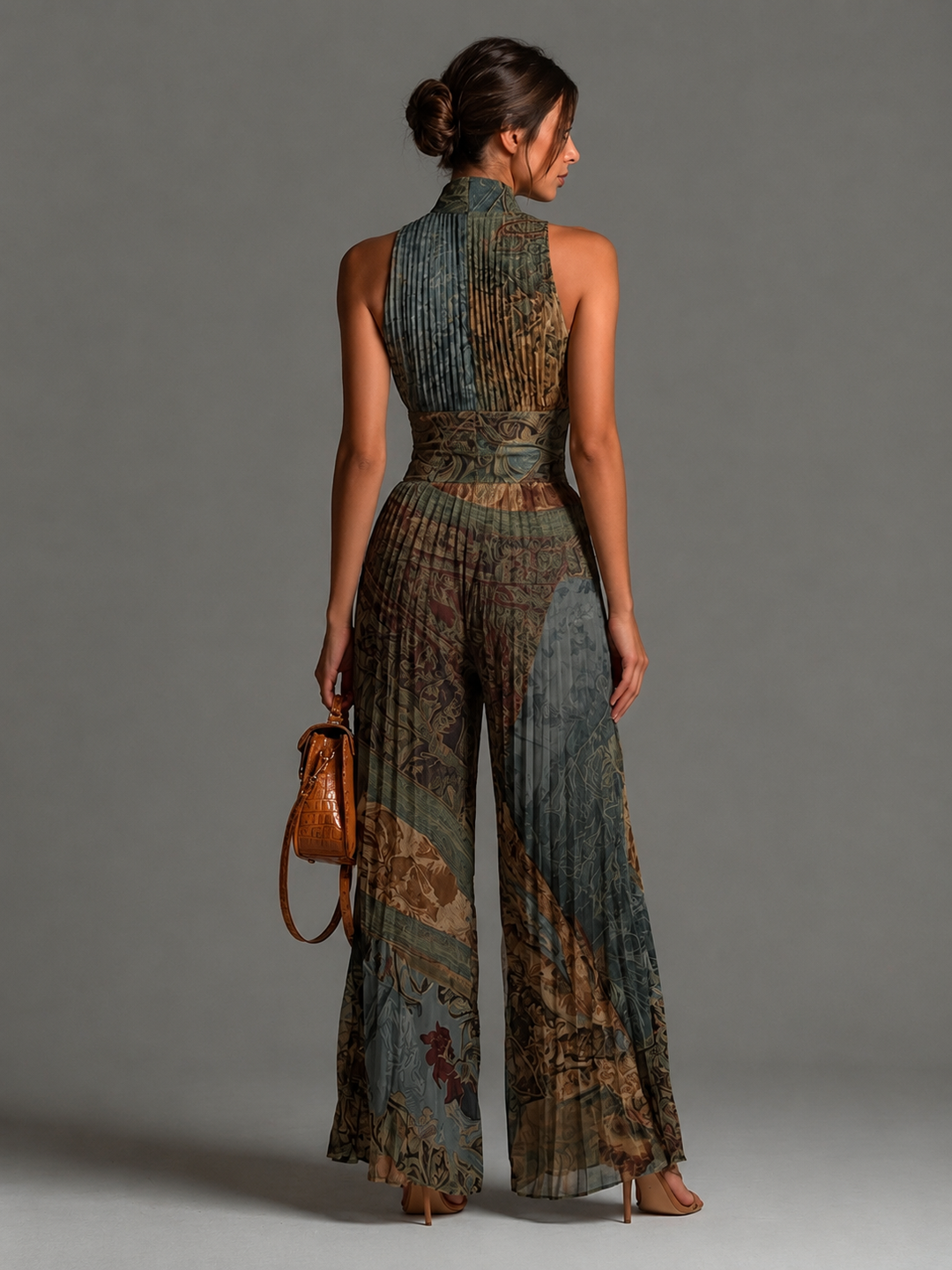 Kleira - Sleeveless Pleated Jumpsuit